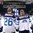 OSTRAVA, CZECH REPUBLIC - MAY 3: Finland's Ossi Louhivaara #23, Jarkko Immonen #26, Tuukka Mantyla #6 and Esa Lindell #7 enjoy their national anthem after a 3-0 victory over Team Denmark during preliminary round action at the 2015 IIHF Ice Hockey World Championship. (Photo by Richard Wolowicz/HHOF-IIHF Images)